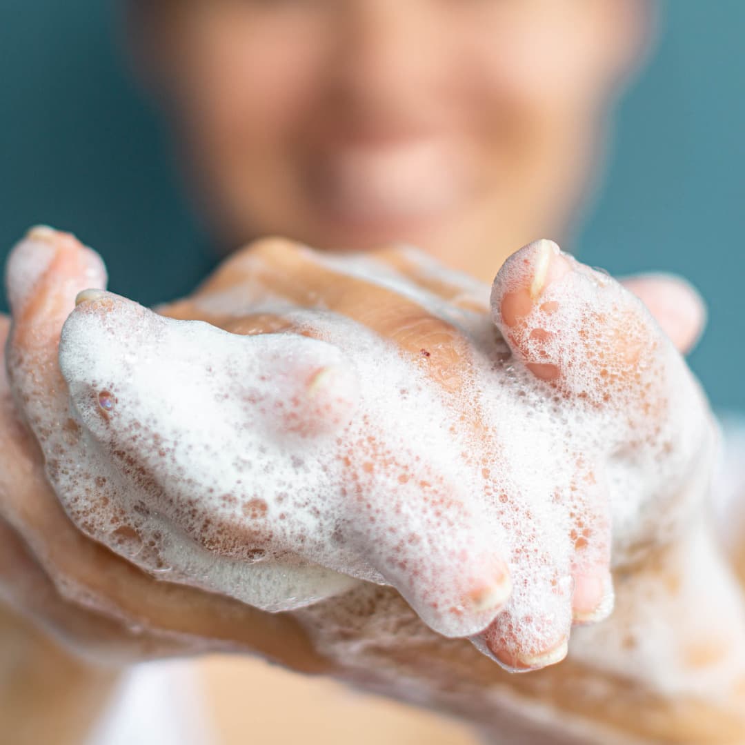 Whipped Soap Lather In Hands
